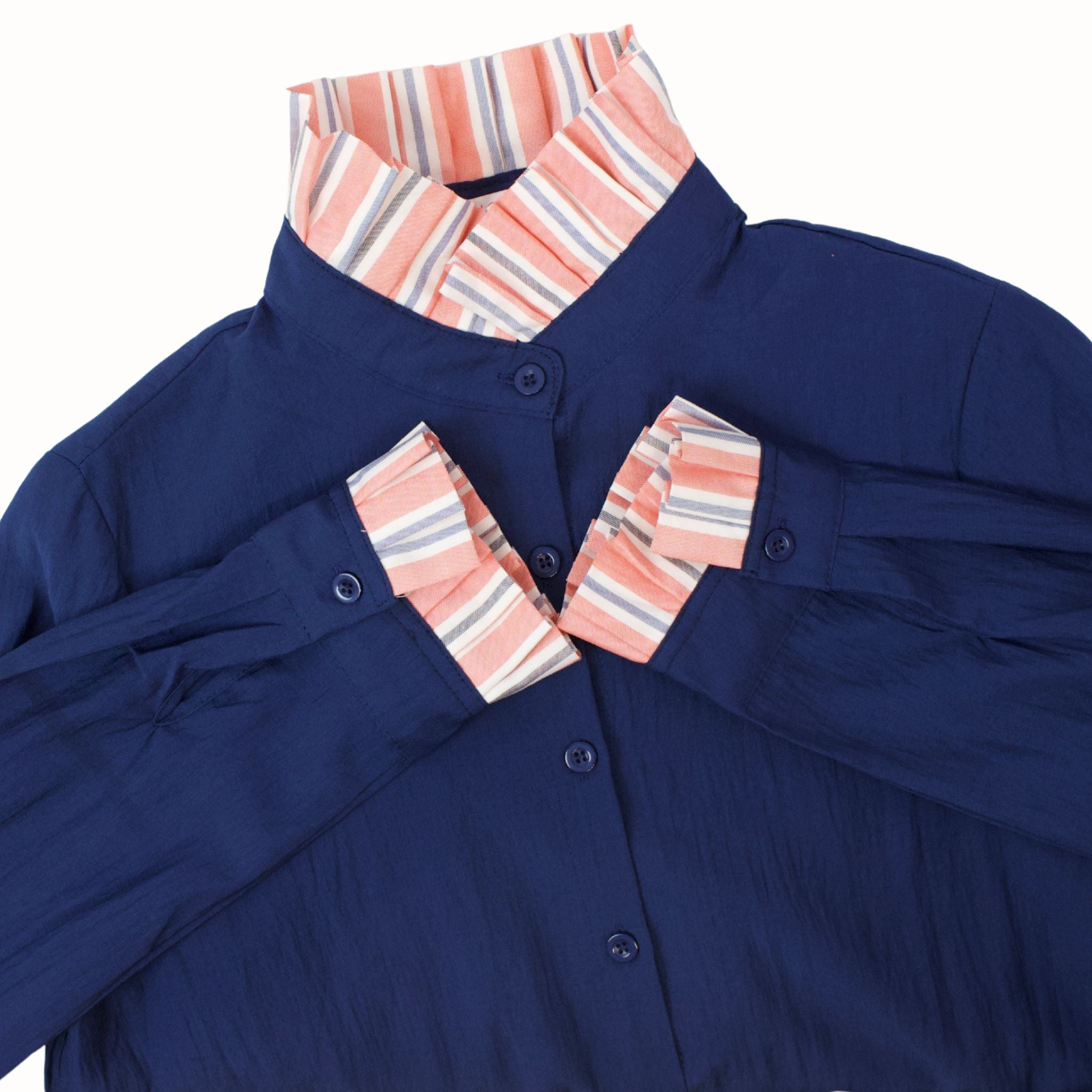 Vista frontal de la Camisa Marino con Naranja.
